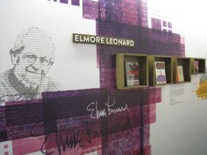 This is a photograph of a wall display in HarperCollins' corporate headquarters museum.