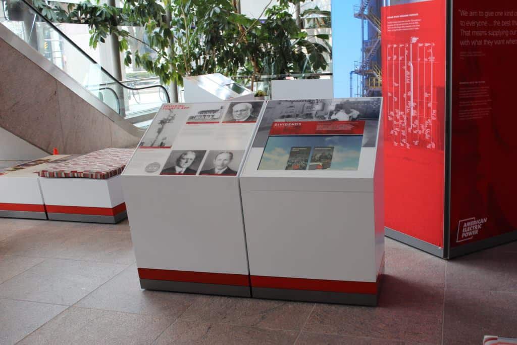 Pictured: American Electric Power's company lobby exhibit, which has an interactive kiosk and standing displays. 